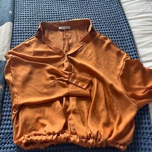 12th tribe - collard orange shirt